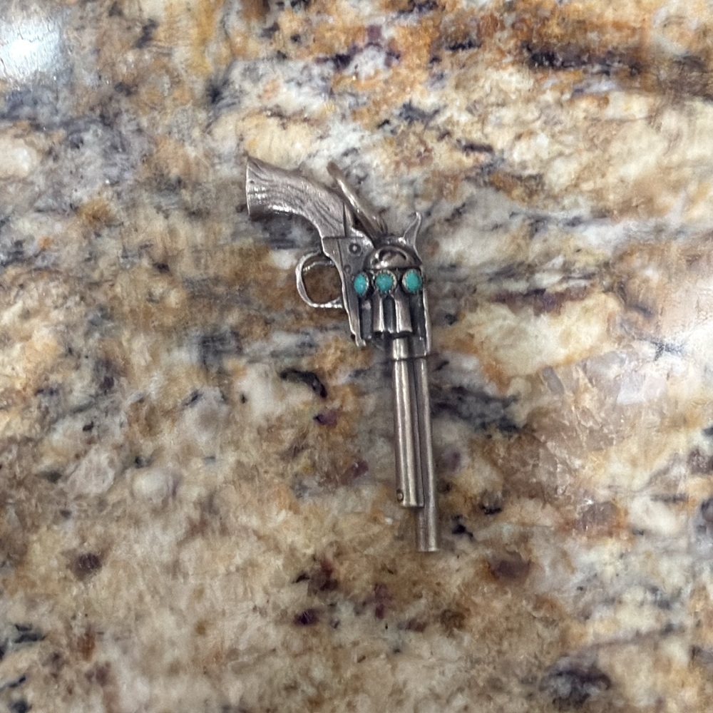 Silver-Tone Revolver Pendant Necklace with authentic turquoise stones
